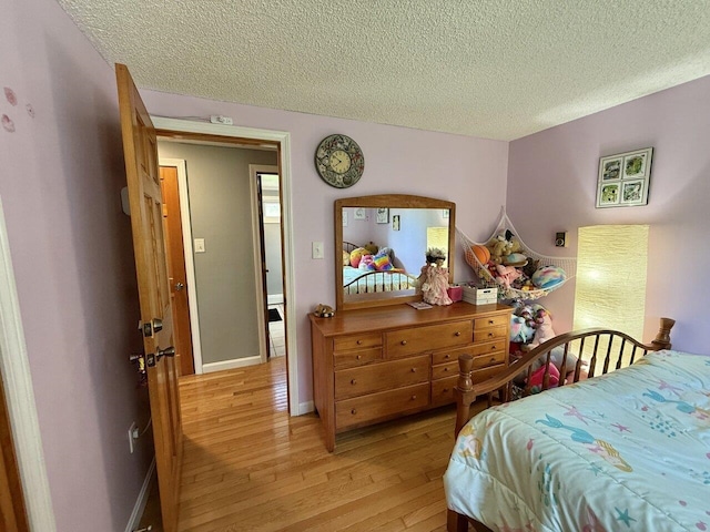 50 New Haven Rd, Vergennes, VT 05491 - bedroom featuring light wood-style floors and a textured ceiling