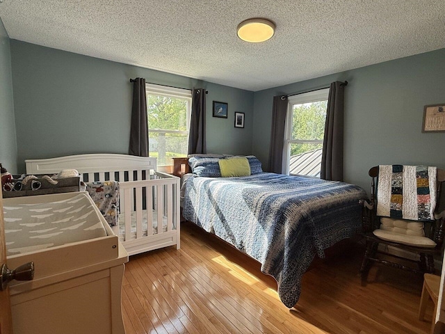 50 New Haven Rd, Vergennes, VT 05491 - bedroom with light wood finished floors and a textured ceiling