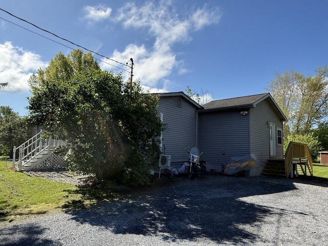 50 New Haven Rd, Vergennes, VT 05491 - view of home's exterior with stairs and a deck