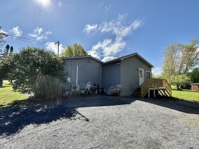 50 New Haven Rd, Vergennes, VT 05491 - back of property with a deck and stairs