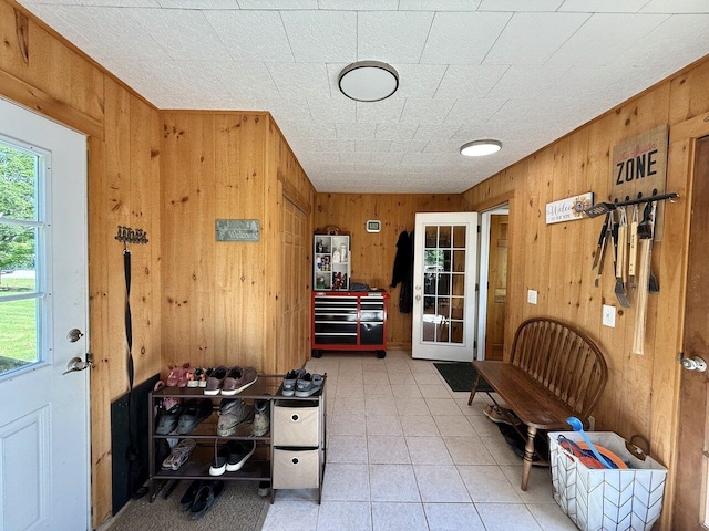 50 New Haven Rd, Vergennes, VT 05491 - foyer with wooden walls and tile patterned flooring