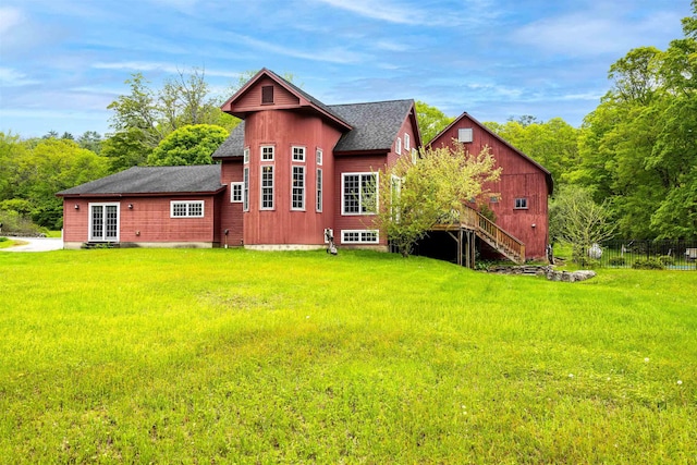 10 Wiswall Hill Rd, Newfane, VT 05345 - back of property featuring a shingled roof and stairway