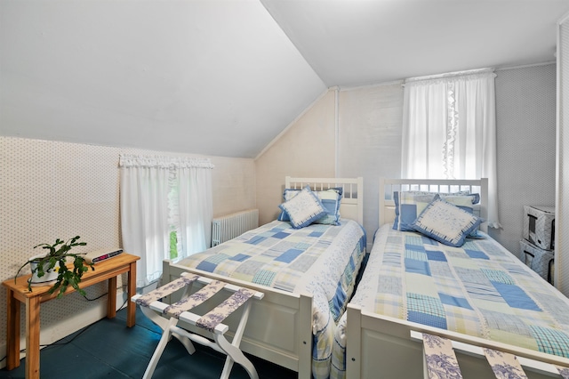 10 Wiswall Hill Rd, Newfane, VT 05345 - bedroom featuring multiple windows, vaulted ceiling, and wallpapered walls