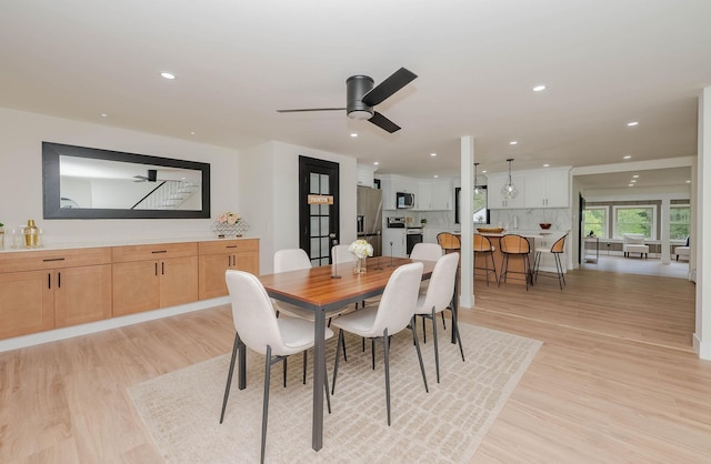 42 College Rd, Stratham, NH 03885 - dining area with ceiling fan, light wood-style floors, and recessed lighting