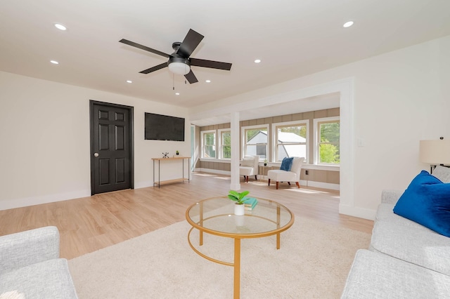 42 College Rd, Stratham, NH 03885 - living area with wood finished floors, recessed lighting, a ceiling fan, and baseboards