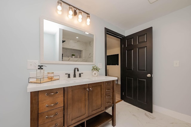 42 College Rd, Stratham, NH 03885 - bathroom with marble look tile flooring, vanity, a shower, and baseboards