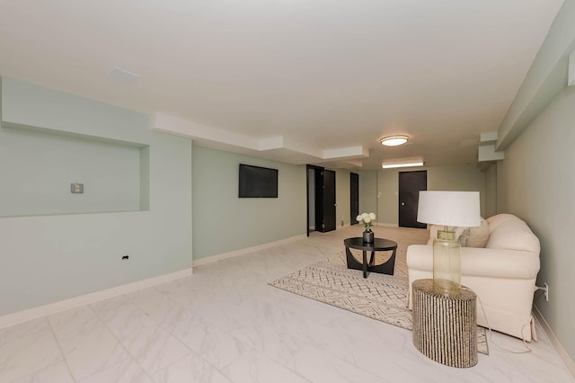 42 College Rd, Stratham, NH 03885 - living room featuring light marble finish floors and baseboards