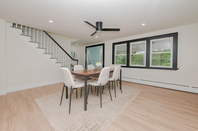 42 College Rd, Stratham, NH 03885 - dining space with baseboard heating, stairs, light wood-style floors, ceiling fan, and recessed lighting