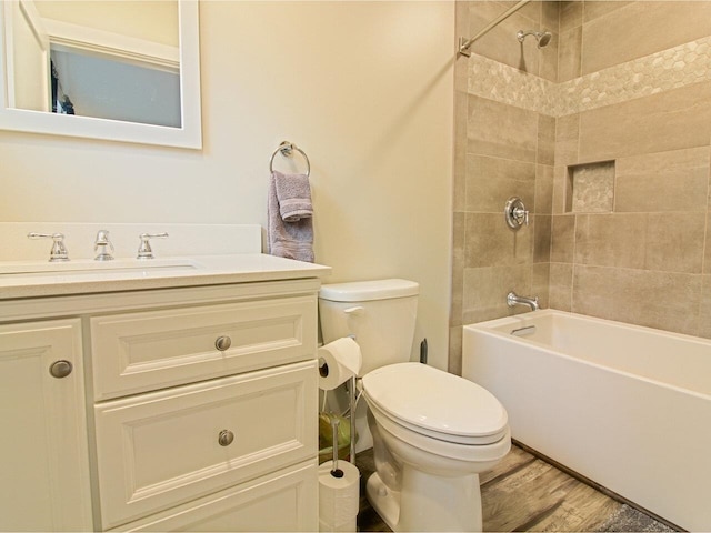 1585 Amidon Rd Unit 1, 2, 3, Montgomery, VT 05471 - full bath featuring toilet, vanity, shower / washtub combination, and wood finished floors