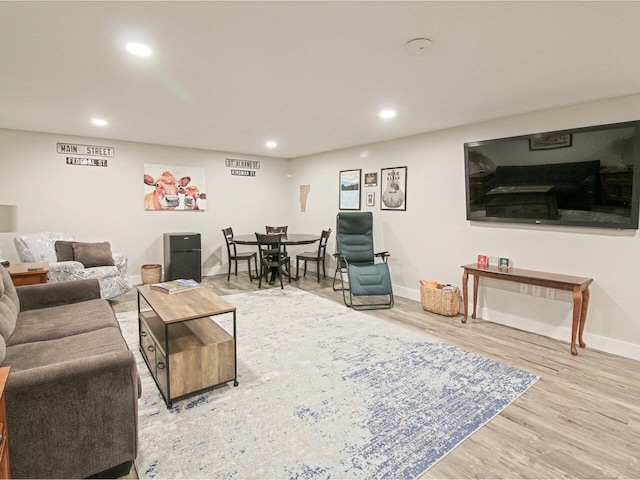 1585 Amidon Rd Unit 1, 2, 3, Montgomery, VT 05471 - living room with wood finished floors, baseboards, and recessed lighting