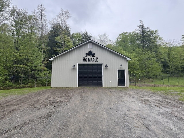 1585 Amidon Rd Unit 1, 2, 3, Montgomery, VT 05471 - detached garage with dirt driveway and a forest view