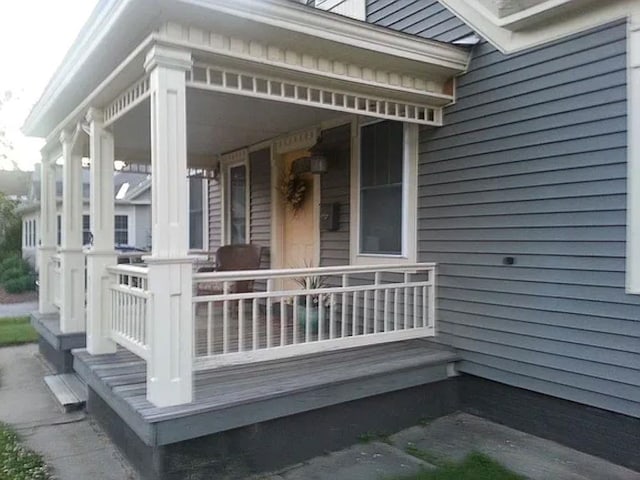 22 Chestnut St, Claremont, NH 03743 - property entrance featuring covered porch