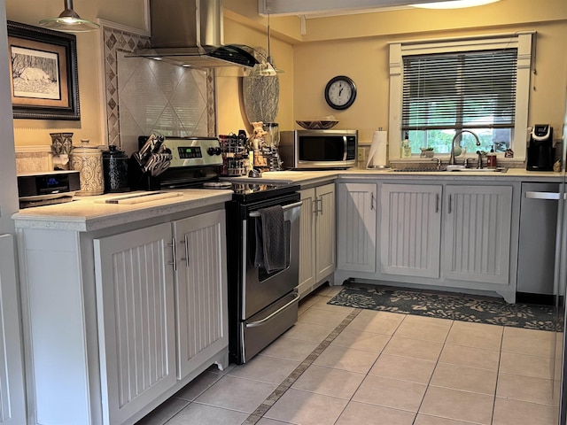 22 Chestnut St, Claremont, NH 03743 - kitchen with stainless steel appliances, extractor fan, a sink, and light tile patterned flooring