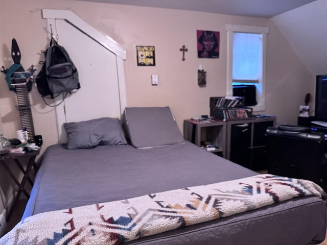 22 Chestnut St, Claremont, NH 03743 - bedroom with lofted ceiling and carpet floors