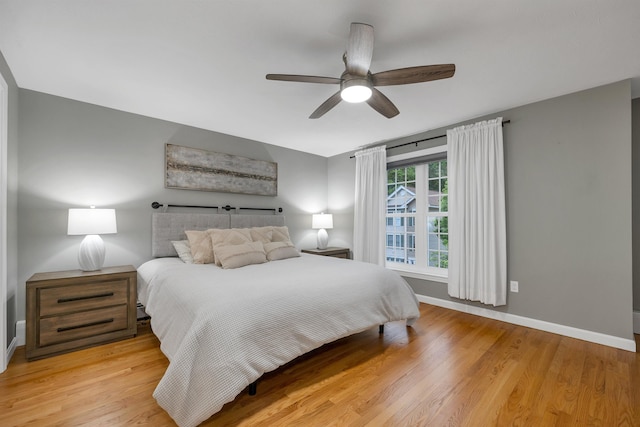 26 Eastwood Way, Manchester, NH 03109 - bedroom with baseboards, light wood finished floors, and ceiling fan