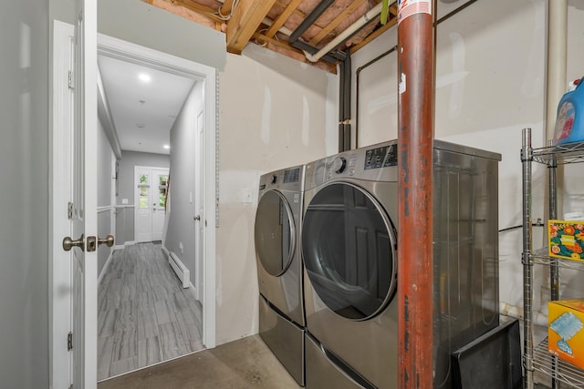 26 Eastwood Way, Manchester, NH 03109 - laundry room with a baseboard radiator, washing machine and clothes dryer, and recessed lighting