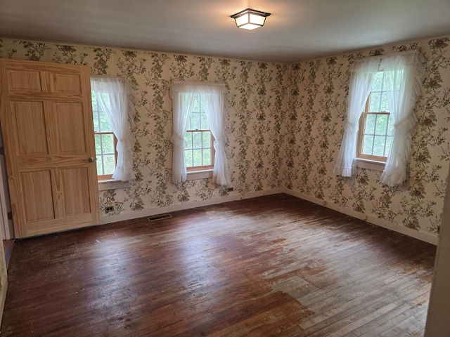 3458 Vt Route 30, Jamaica, VT 05343 - spare room featuring hardwood / wood-style flooring and baseboards