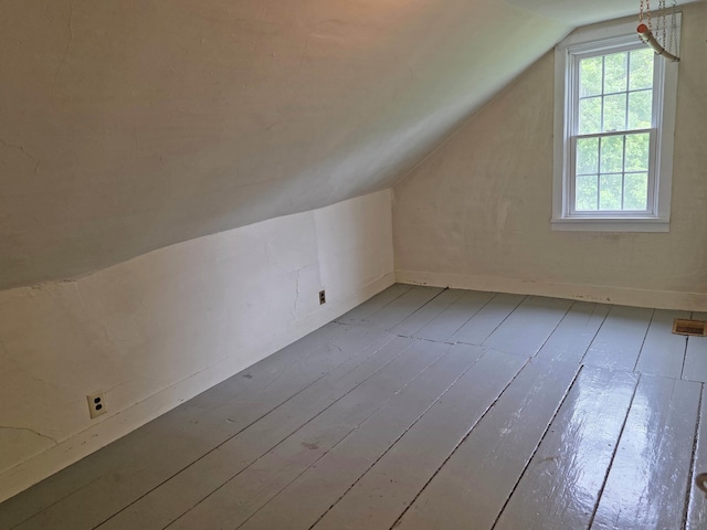 3458 Vt Route 30, Jamaica, VT 05343 - bonus room with hardwood / wood-style floors, lofted ceiling, and baseboards
