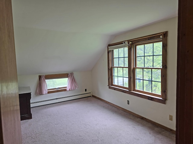 3458 Vt Route 30, Jamaica, VT 05343 - bonus room with a baseboard heating unit, lofted ceiling, carpet, and baseboards