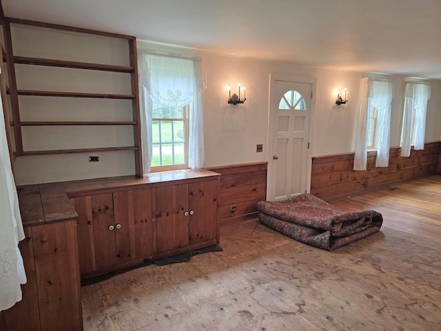3458 Vt Route 30, Jamaica, VT 05343 - bathroom featuring plenty of natural light, wood walls, and wood finished floors
