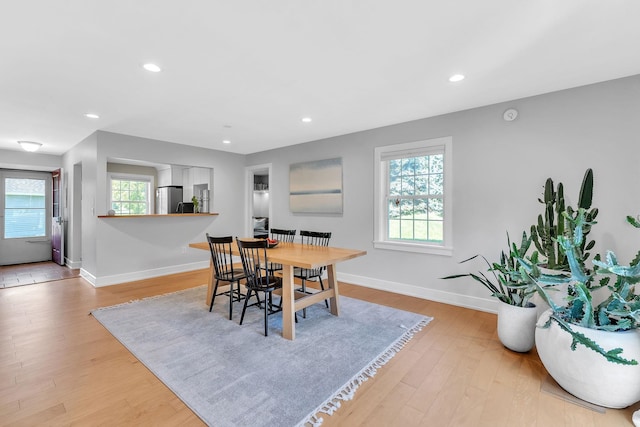 9 Conifer Ct, Burlington, VT 05401 - dining space featuring baseboards, light wood-style floors, and recessed lighting