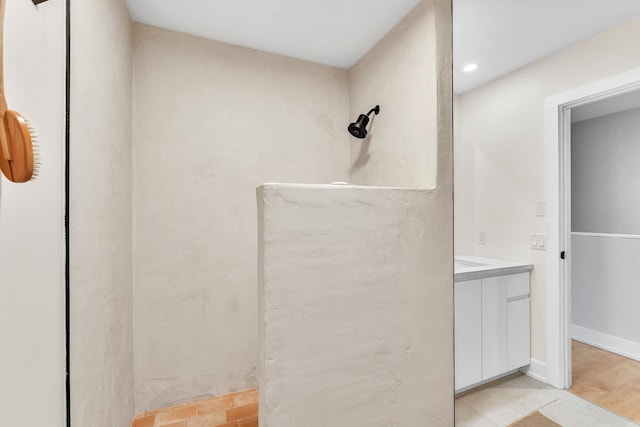 9 Conifer Ct, Burlington, VT 05401 - full bathroom with vanity, tile patterned flooring, a shower, and recessed lighting