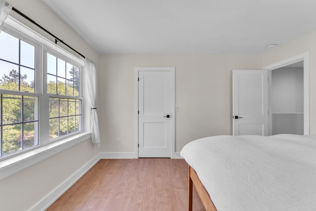 9 Conifer Ct, Burlington, VT 05401 - bedroom featuring baseboards and light wood-type flooring