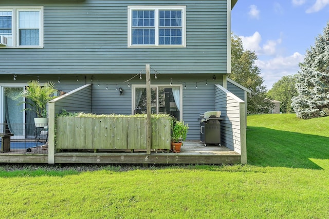 9 Conifer Ct, Burlington, VT 05401 - back of house featuring a wooden deck and a lawn