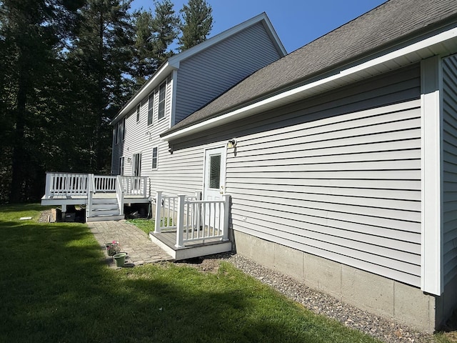 4 Sunblaze Dr, Nashua, NH 03062 - view of property exterior with a deck, a lawn, and roof with shingles