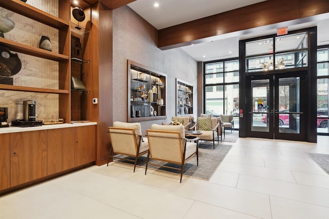 18 Artisan Dr Unit 419, Salem, NH 03079 - common area featuring a towering ceiling, recessed lighting, and beam ceiling