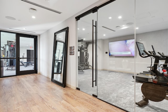 18 Artisan Dr Unit 419, Salem, NH 03079 - workout area featuring wood finished floors, recessed lighting, and baseboards