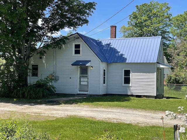 10 Deering Center Rd, Deering, NH 03244 - rear view of property with a chimney and metal roof