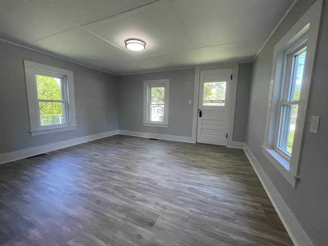 10 Deering Center Rd, Deering, NH 03244 - empty room featuring healthy amount of natural light, baseboards, and dark wood-style flooring