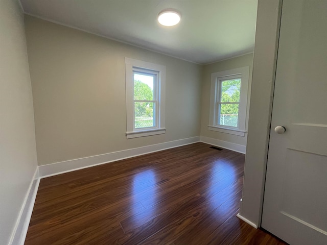 10 Deering Center Rd, Deering, NH 03244 - spare room featuring healthy amount of natural light, dark wood-type flooring, baseboards, and ornamental molding