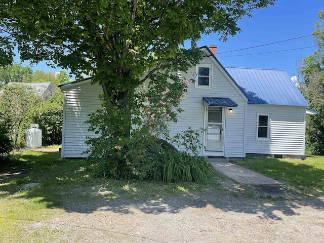 10 Deering Center Rd, Deering, NH 03244 - view of front of property with a chimney and metal roof
