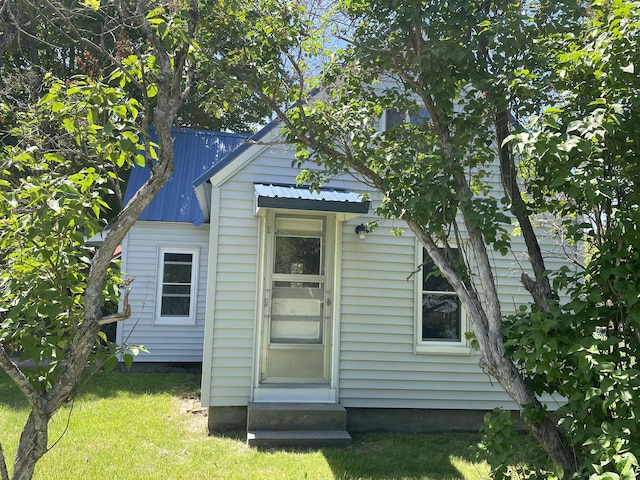 10 Deering Center Rd, Deering, NH 03244 - rear view of property featuring metal roof and a lawn