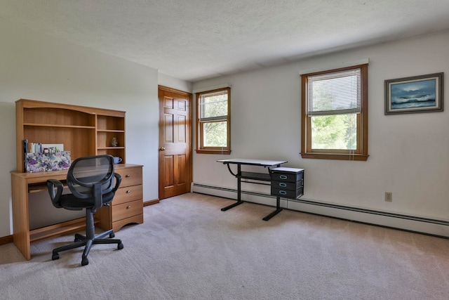 3 Elijah Hill Ln, Londonderry, NH 03053 - home office with baseboard heating, light carpet, healthy amount of natural light, and a textured ceiling