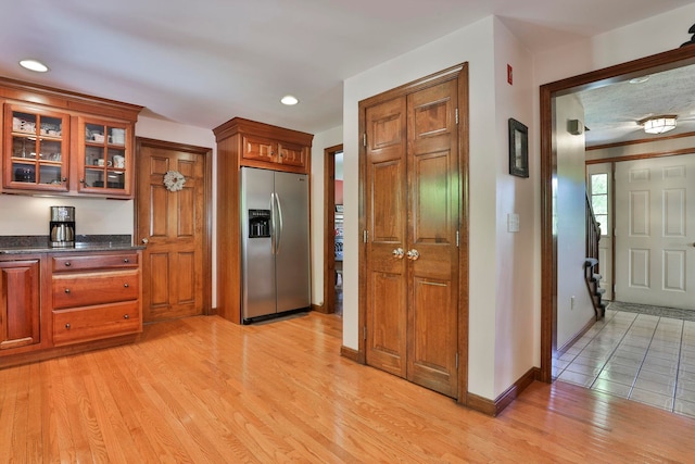 3 Elijah Hill Ln, Londonderry, NH 03053 - kitchen with stainless steel fridge, light wood-type flooring, glass insert cabinets, baseboards, and recessed lighting