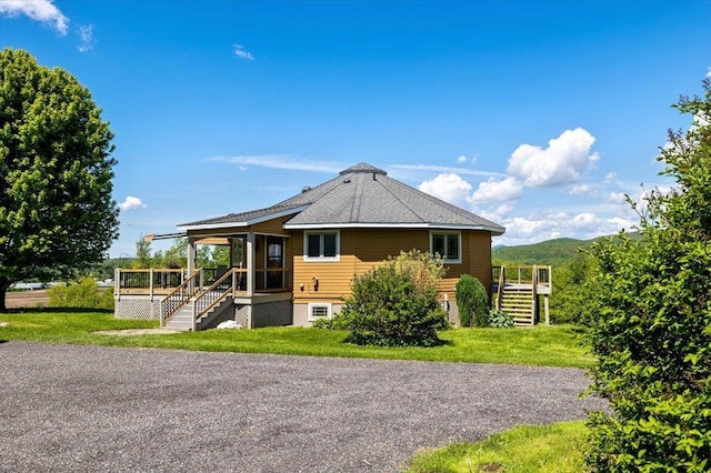 300 River Rd, Enosburg, VT 05450 - back of house with stairs, a lawn, and a deck