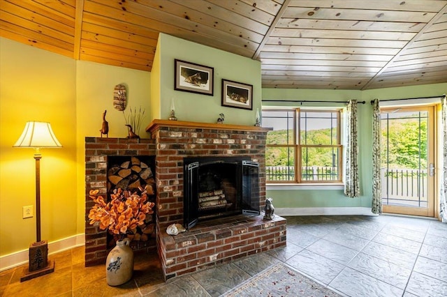 300 River Rd, Enosburg, VT 05450 - living room featuring a fireplace, wood ceiling, baseboards, and lofted ceiling
