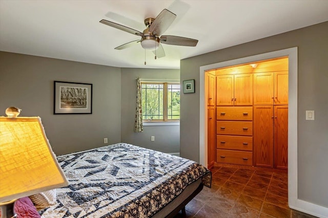 300 River Rd, Enosburg, VT 05450 - bedroom with ceiling fan and dark tile patterned flooring