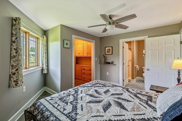 300 River Rd, Enosburg, VT 05450 - bedroom featuring baseboards, ensuite bathroom, and a ceiling fan