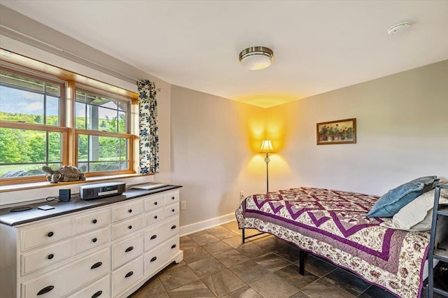300 River Rd, Enosburg, VT 05450 - bedroom featuring baseboards and stone finish floors