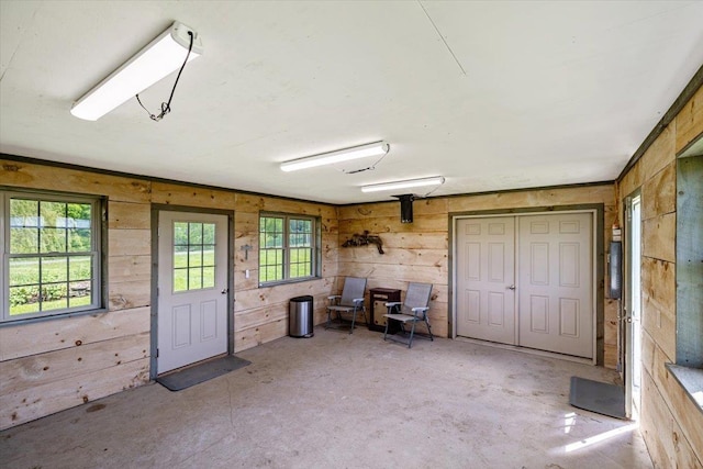 300 River Rd, Enosburg, VT 05450 - interior space with wooden walls and concrete flooring