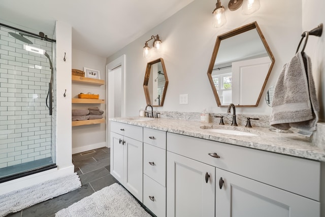 218 Manchester St, Nashua, NH 03064 - bathroom featuring double vanity and a stall shower