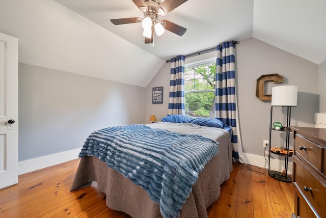 218 Manchester St, Nashua, NH 03064 - bedroom with lofted ceiling, wood-type flooring, baseboards, and a ceiling fan