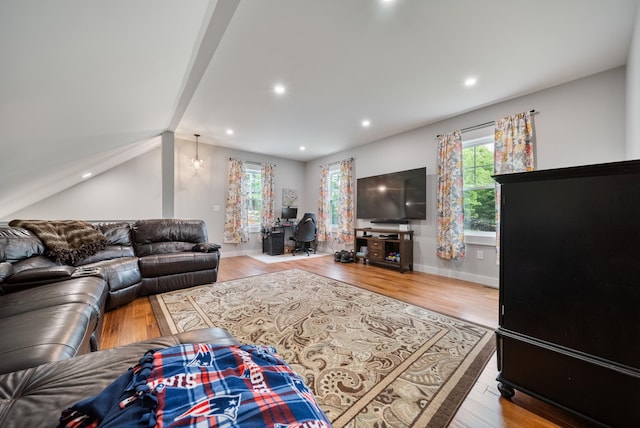 218 Manchester St, Nashua, NH 03064 - living area featuring healthy amount of natural light, wood finished floors, recessed lighting, and baseboards