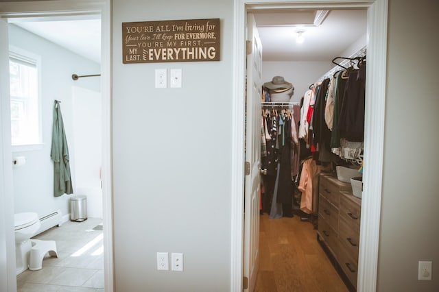 7 Plum St, Concord, NH 03301 - spacious closet featuring baseboard heating and wood finished floors