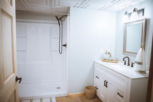 7 Plum St, Concord, NH 03301 - full bath with a shower, vanity, and baseboards