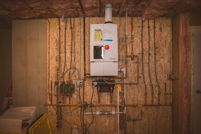 7 Plum St, Concord, NH 03301 - utility room featuring water heater